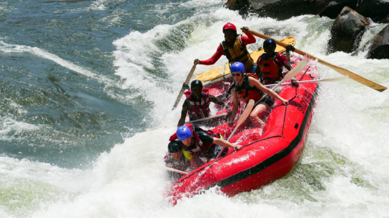 people on boat for rafting